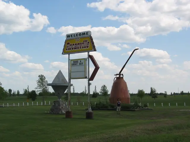 Welcome sign and giant oil can